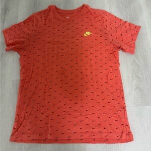 Orange Nike T Shirt Size Large , short sleeve shirt, orange with blue swish